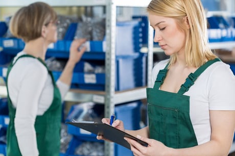 Youthful attractive girl is checking the product list