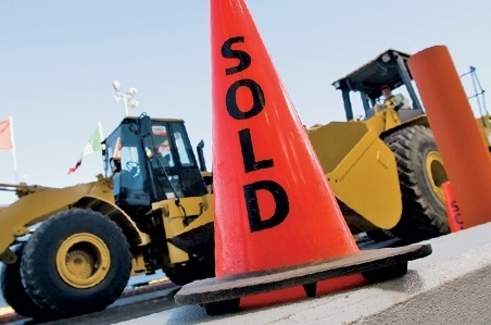 cone with "sold" sign